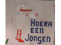Ooievaar spandoek jongen